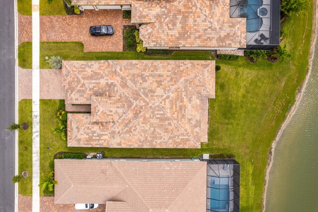 drone / aerial view featuring a water view