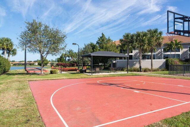 view of basketball court with a yard and a gazebo