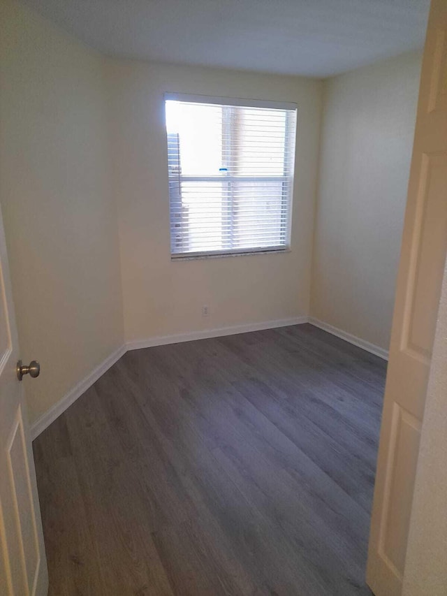 empty room featuring hardwood / wood-style floors