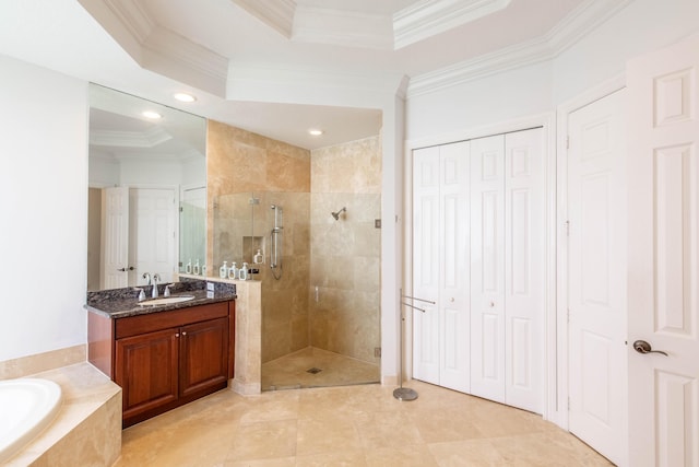 full bath featuring a garden tub, recessed lighting, vanity, ornamental molding, and a shower stall