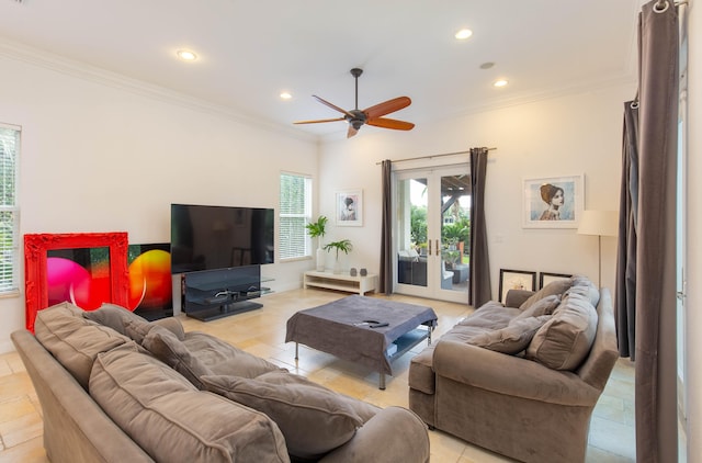 tiled living room with ceiling fan, french doors, and ornamental molding