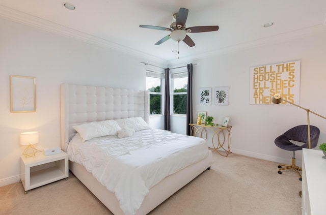 bedroom with baseboards, ornamental molding, ceiling fan, and carpet flooring