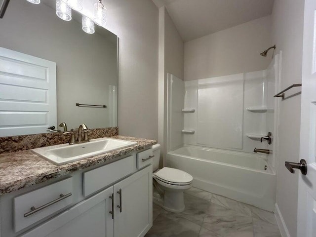 5483 Lugo St, Fort Pierce, FL 34951 - full bath with marble look tiles, vanity, toilet, bathing tub / shower combination, and baseboards