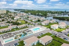 bird's eye view with a water view