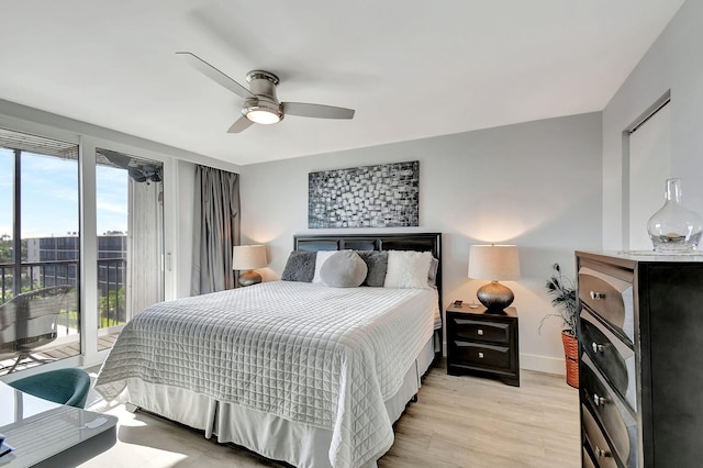 bedroom featuring ceiling fan, light hardwood / wood-style flooring, and access to exterior