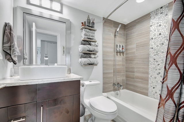 full bathroom featuring toilet, vanity, and shower / bathtub combination with curtain