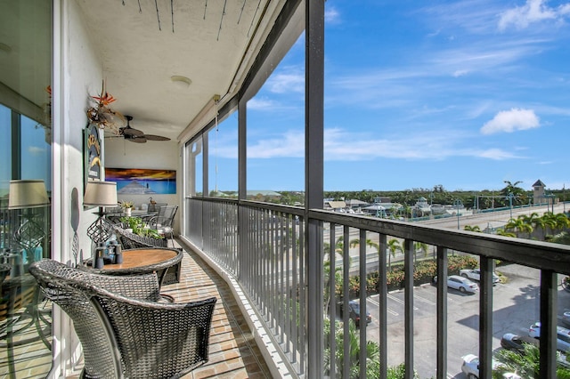 balcony featuring ceiling fan