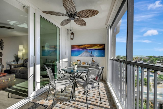 balcony featuring ceiling fan