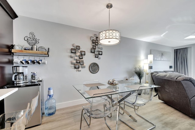 dining room with light hardwood / wood-style floors