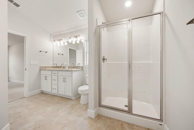 bathroom featuring vanity, a shower with door, lofted ceiling, tile patterned floors, and toilet