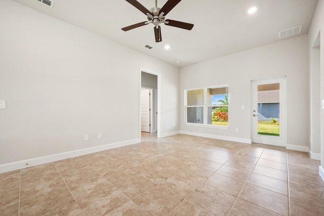 spare room with ceiling fan