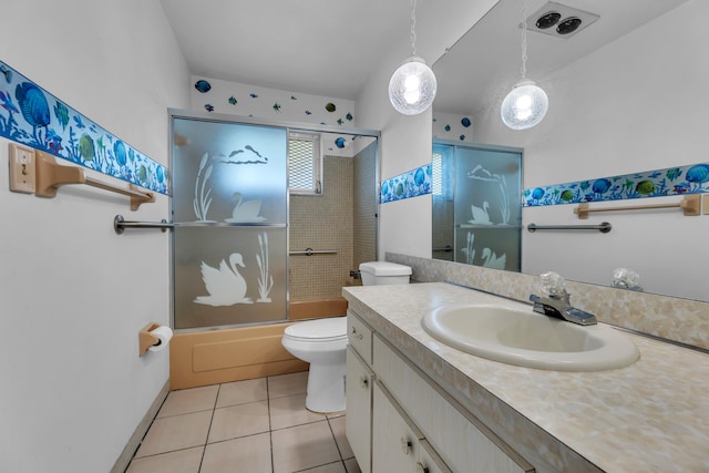 full bathroom with combined bath / shower with glass door, vanity, toilet, and tile patterned flooring