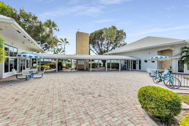 exterior space with a carport