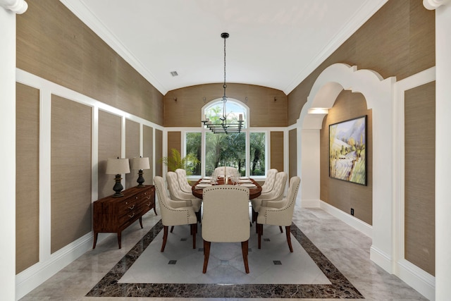 dining room with light tile patterned floors, a notable chandelier, and vaulted ceiling