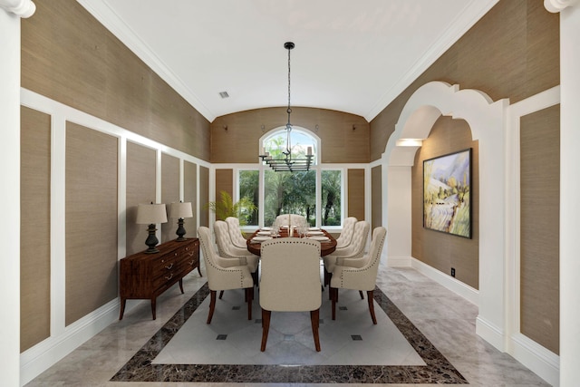 dining space with vaulted ceiling, an inviting chandelier, baseboards, and marble finish floor