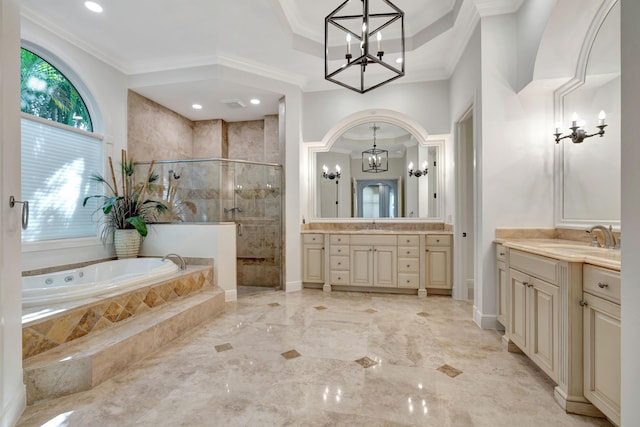 full bath featuring a stall shower, a notable chandelier, a sink, a garden tub, and crown molding