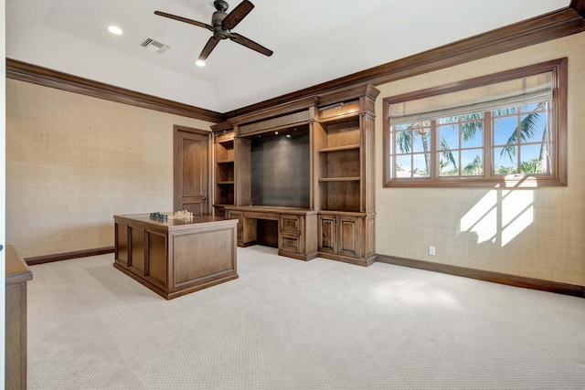 unfurnished office featuring light carpet, crown molding, and ceiling fan