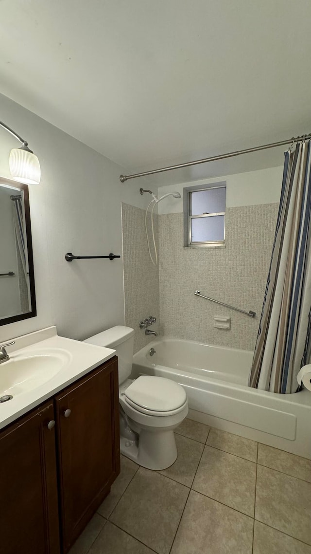 full bathroom with tile patterned flooring, shower / bath combo, toilet, and vanity