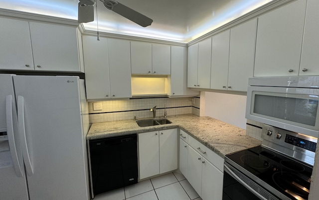 kitchen featuring ceiling fan, white cabinets, light stone counters, sink, and white appliances