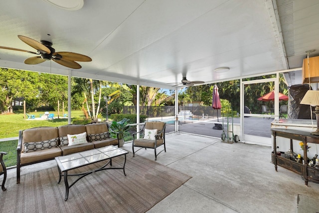 sunroom / solarium with ceiling fan