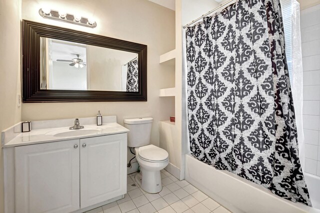 full bathroom featuring toilet, tile patterned floors, shower / tub combo, and vanity