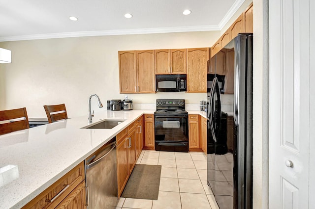 kitchen featuring light tile patterned flooring, sink, ornamental molding, light stone counters, and black appliances