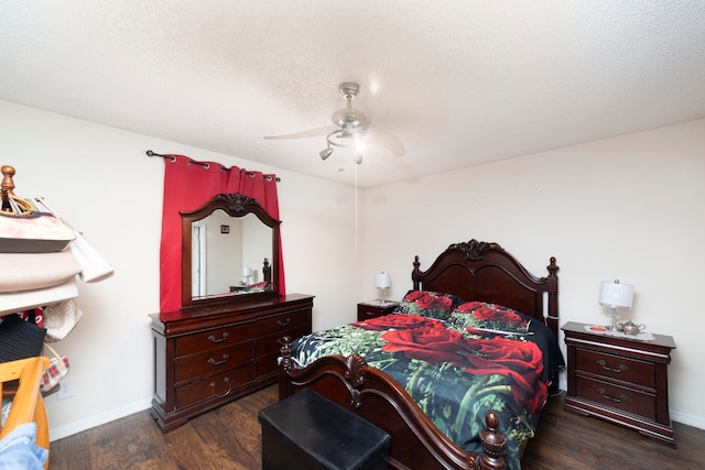 bedroom featuring a textured ceiling, ceiling fan, and dark hardwood / wood-style floors