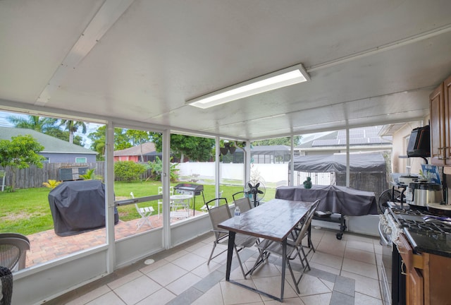 sunroom featuring a healthy amount of sunlight