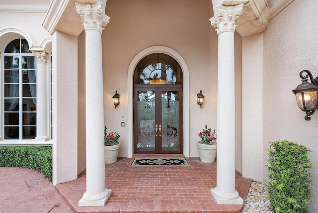 property entrance featuring french doors