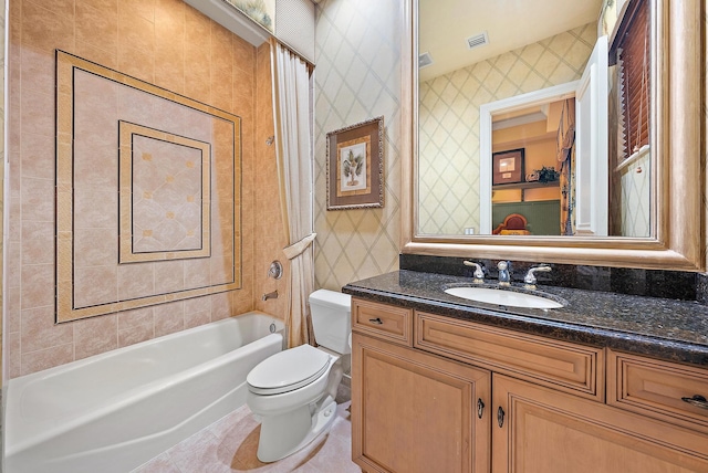 full bathroom with tile patterned flooring, toilet, tub / shower combination, and vanity