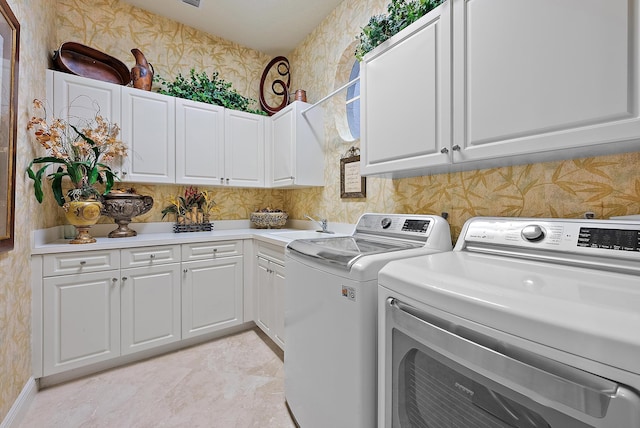 laundry room with sink, washer and dryer, cabinets, and light tile patterned flooring