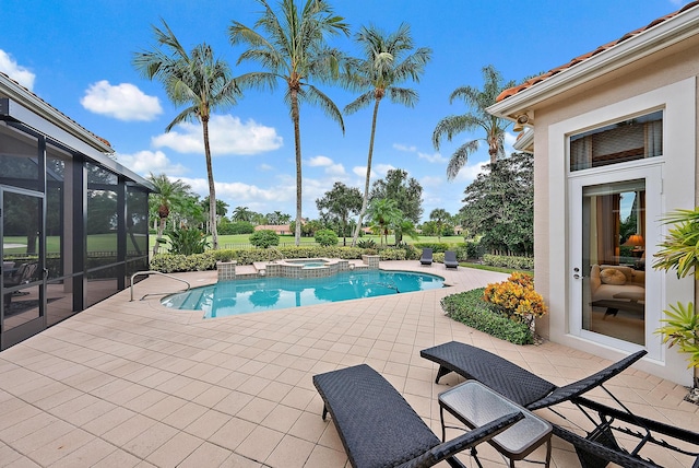 view of pool featuring an in ground hot tub and a patio