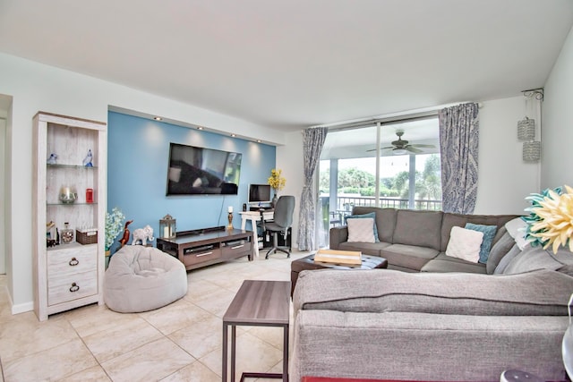 tiled living room featuring ceiling fan