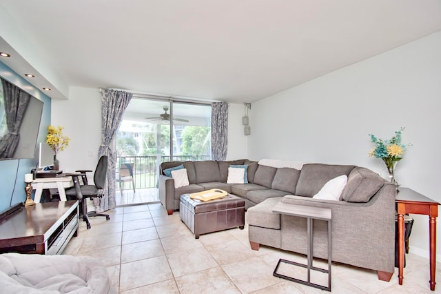 tiled living room with ceiling fan