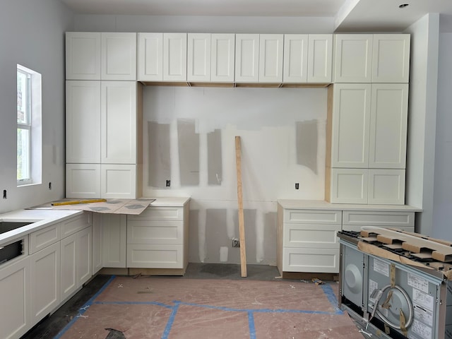 kitchen featuring white cabinetry