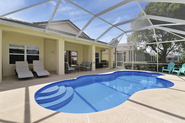 pool with a patio and outdoor lounge area