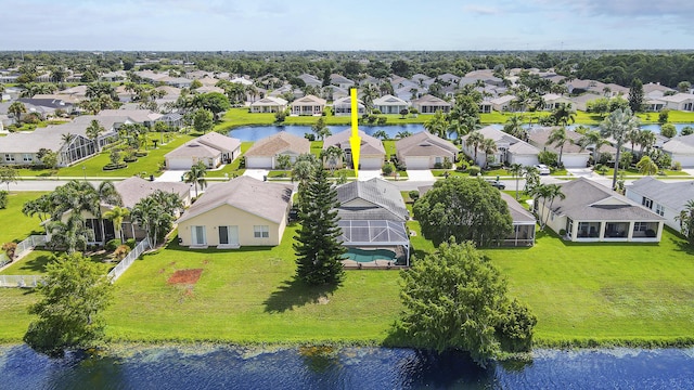 aerial view featuring a water view and a residential view