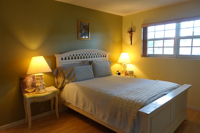 bedroom featuring hardwood / wood-style flooring