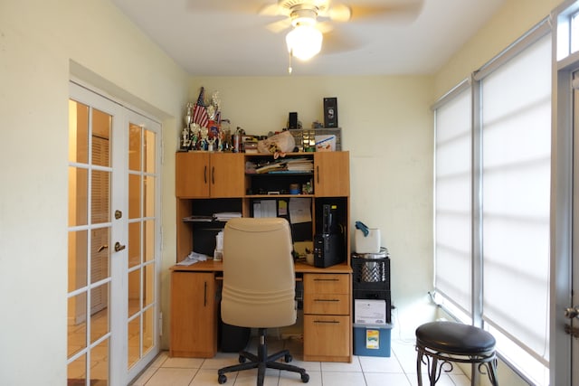 tiled office space featuring ceiling fan and french doors