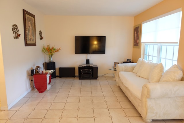 living room with light tile patterned flooring