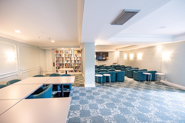 interior space featuring carpet flooring and ornamental molding