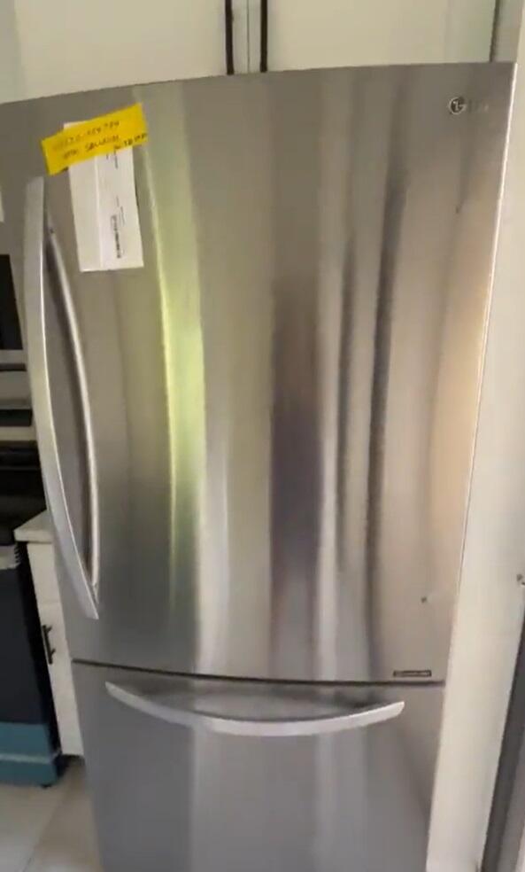 interior details with stainless steel fridge