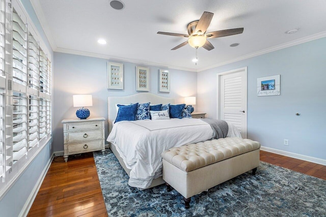 bedroom featuring crown molding, dark hardwood / wood-style flooring, ceiling fan, and a closet