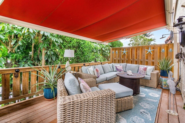 wooden terrace featuring an outdoor hangout area