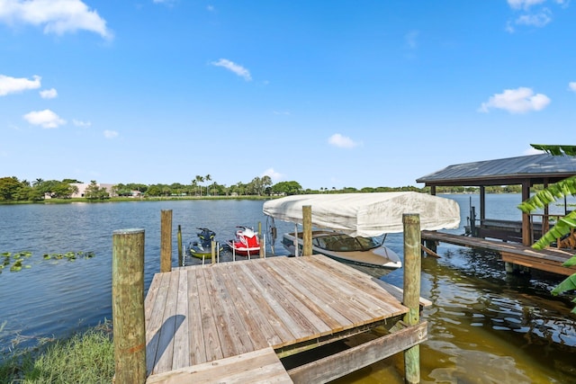 920 Hibiscus Ln, Delray Beach, FL 33444 - dock area featuring a water view and boat lift