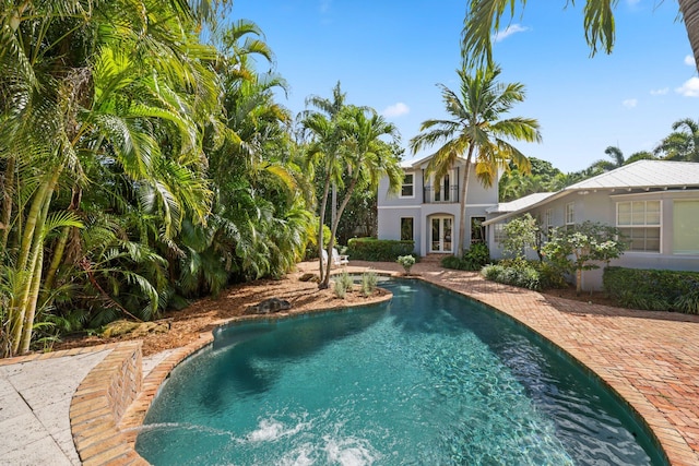 920 Hibiscus Ln, Delray Beach, FL 33444 - outdoor pool featuring french doors