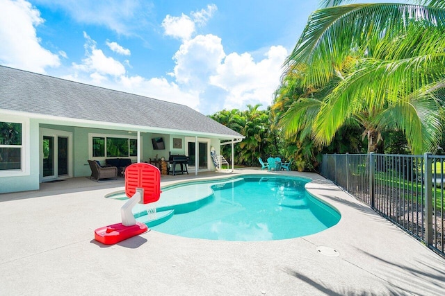 view of pool featuring a patio area