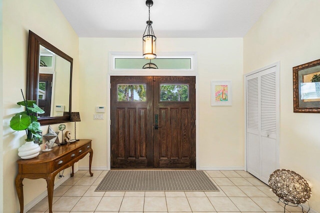 tiled entryway with plenty of natural light