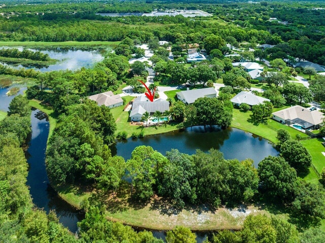 bird's eye view with a water view