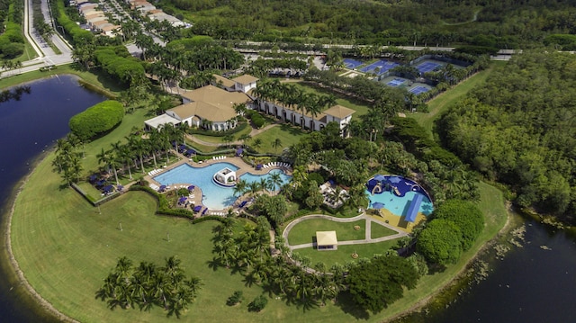 birds eye view of property with a water view